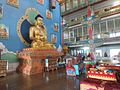 Pozlacená socha Buddhy v dacanu Rinpoče Bagša