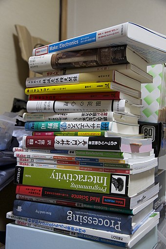 A stack of books found after cleaning a room