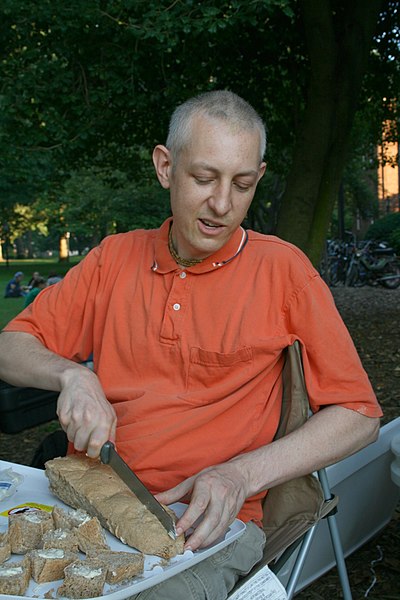 File:2008-09-04 Jaga cutting bread at Krishna Dinner at UNC.jpg