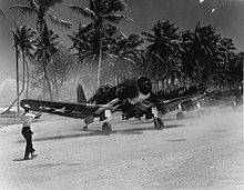 Vought F4U-1A/D Corsair fighters warming up at Majuro 80-G-425529.jpg