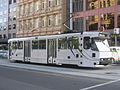 An A2-class tram on Flinders Street