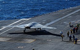 A U.S. Navy X-47B unmanned combat air system demonstrator aircraft prepares to launch from the flight deck of the aircraft carrier USS Theodore Roosevelt (CVN 71) Nov. 10, 2013, while underway in the Atlantic 131110-N-GN619-041.jpg