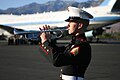 A trumpet player with 3rd Marine Aircraft Wing tests out his instrument before performing ceremonial honors for former President Gerald R. Ford (061230-M-3913K-006).jpg