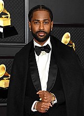 Grande and Big Sean recorded three songs together: "Best Mistake", "Research" and "Right There". Big Sean also appeared uncredited on "Problem". Anderson at the 2021 Grammys (cropped).jpg