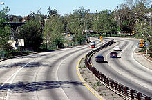 Looking south from Marmion Way showing the passing lanes, differently-colored from using different paving materials. Arroyo Seco Parkway from Marmion Way.jpg