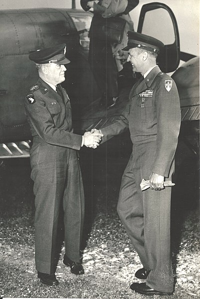 File:BG Bogardus Cairns Greets General MacAuliffe -- France-- 29 Mar 1955.jpg