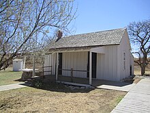 In Texas and some other areas box houses are known as box and strip houses; the strips are the battens. Box and Strip House, NHRC, Lubbock, TX IMG 1615.JPG