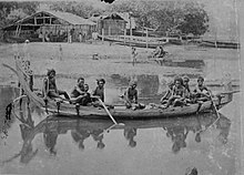 A group of men from Gorontalo in a prahu, circa 1895-1905. COLLECTIE TROPENMUSEUM Portret van een groep mannen uit Gorontalo in een prauw TMnr 60037661.jpg