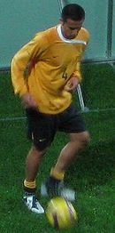 Cahill warming up before a FIFA World Cup qualifier against Qatar, in Brisbane, on 15 October 2008 Cahill in Brisbane 08.jpg