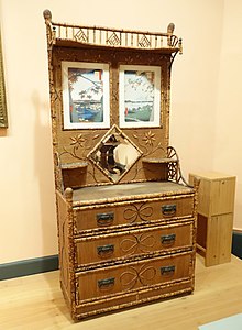 Chest of drawers, woven cane, bamboo, brass and mirror, by Nimura & Sato of Brooklyn, 1905-1915 Chest of Drawers, Nimura & Sato, Brooklyn, c. 1905, woven cane, bamboo, brass, glass - Brooklyn Museum - DSC09520.JPG