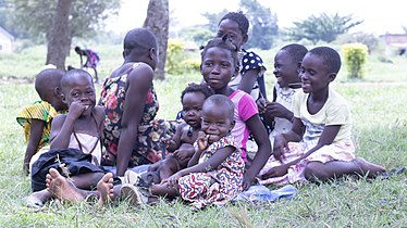 Children smiling Photo by Tonny Mpagi