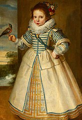 A Young Girl holding a Chaffinch