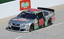 Earnhardt on pit road during the 2013 STP Gas Booster 500 at Martinsville Speedway Dale Earnhardt, Jr., 2013 STP Gas Booster 500 (cropped).jpg