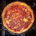 Deep dish pizza, homemade, with tomato paste and a little soy sauce, mixed vegetables, chicken, stewed beef, mozzarella, and cheddar cheeses - Massachusetts.jpg