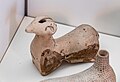 Etrusco-Corinthian plastic aryballos - croucing ram - Roma MNEVG
