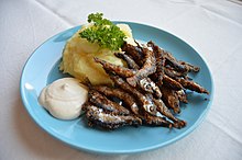 Fried vendace is a popular summertime food in Finland. Finnish fried vendace (Paistetut muikut).jpg