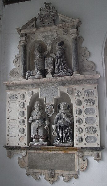 Mural monument erected in 1638 in Weare Giffard Church, the top tier showing Hugh Fortescue (1544–1600), son of Richard Fortescue, and his wife Mary C