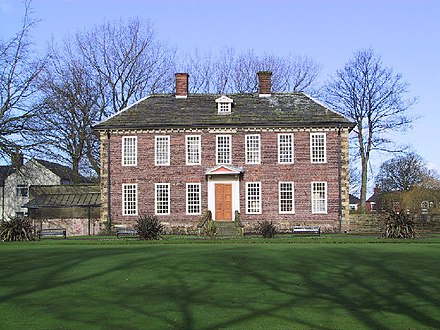 The Grade II* listed building 18th century Foxdenton Hall, a former manor house and mansion, with public gardens. It has been fully restored.
