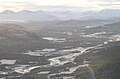 Folldal valley with Rondane mountaing range as backdrop. From Moskardskampen.