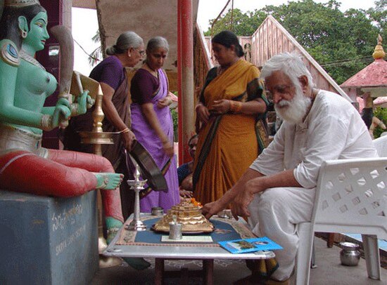 Sri Guru Amritananda Nath Saraswati, performing the Navavarana Puja, an important ritual in Srividya Tantric Shaktism, at the Sahasrakshi Meru Temple 