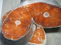 Henneguya salminicola, a parasite commonly found in the flesh of salmonids on the West Coast of Canada. Coho salmon Henneguya salminicola in flesh of coho salmon, BC, Canada.JPG