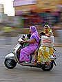 Women riding a Honda Activa