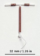 A copper intrauterine device (IUD). IUD with scale.jpg