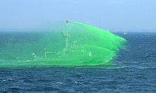 Japan Coast Guard patrol boat with water cannons discharging Japan Coast Guard PC23.jpg