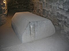Lid of abandoned sarcophagus near the entrance
