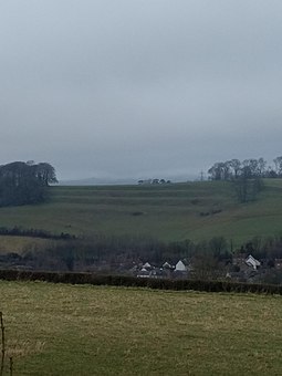 Lynchets above the village of Loders, Dorset Loders Lynchet theatre.jpg