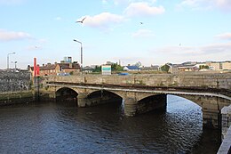 London Bridge from the eastern bank of the Dodder looking downstream