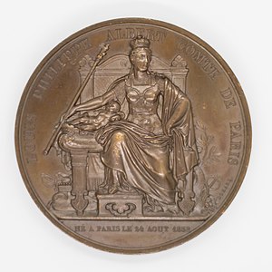 Médaille produite durant la Monarchie de Juillet (revers), avec l'inscription "Louis Philippe Albert, comte de Paris, né à Paris le 24 août 1838".
