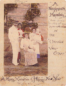 1892 Christmas card with a coloured photo of the Tolkien family in Bloemfontein, sent to relatives in Birmingham, England Mabel Suffield Christmas Card.jpg