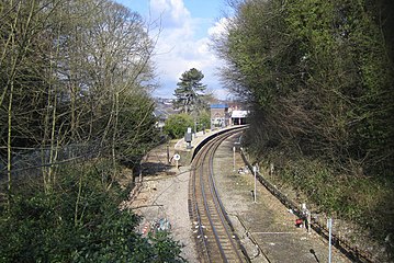 The approach to the station, looking north, showing (left and right) where tracks were formerly laid