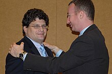 Pockrass receiving an award from the National Motorsports Press Association (NMPA) in 2010 NMPA 2010-2 163 Bob Pockrass (4285284275).jpg