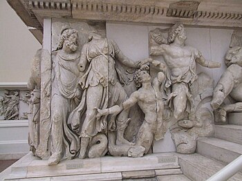 Left to right: Nereus, Doris, a Giant (kneeling), Oceanus, detail from the Pergamon Altar Gigantomachy.[87]