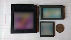 Clockwise from left: A Game Boy Color game cartridge, a Game Boy Advance game cartridge, and a Nintendo DS game cartridge. On the far right is a United States Nickel shown for scale. Nintendo Game Cartridge Size Comparison.jpg