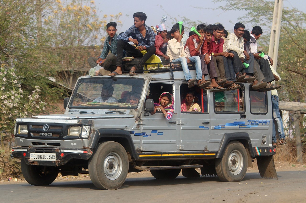 overloaded car with people