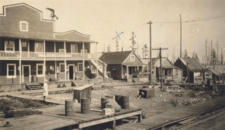 The Mayo Lumber Co. offices stand next to the train tracks in Paldi, British Columbia, late 1920s Paldi BC.png