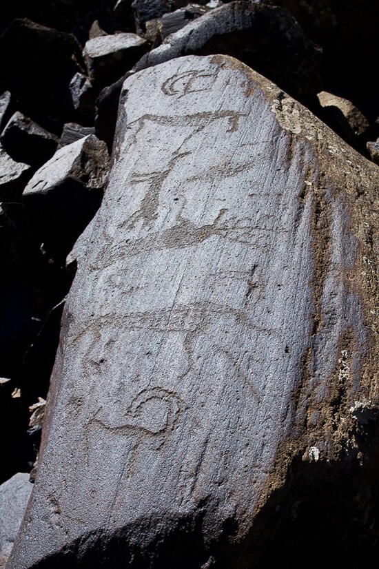 Ughtasar Petroglyphs, These petroglyphs, some believed to date back to the Paleolithic (12,000 BCE), are carved onto dark brownish-black volcanic ston