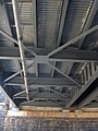 The John F. Kennedy Boulevard Bridge in Philadelphia was built in 1959 and reconstructed 2009 by the Pennsylvania Department of Transportation. It carries John F. Kennedy Boulevard (two lanes westbound, one lane eastbound) across the Schuylkill River, Schuylkill River Trail, and CSX Transportation tracks. Looking up from the Schuylkill River Trail