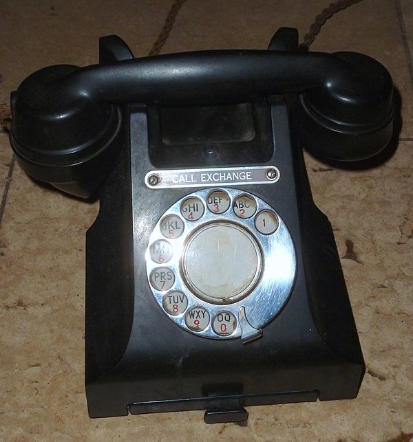 Telephone with letters on its rotary dial (1950s, UK)