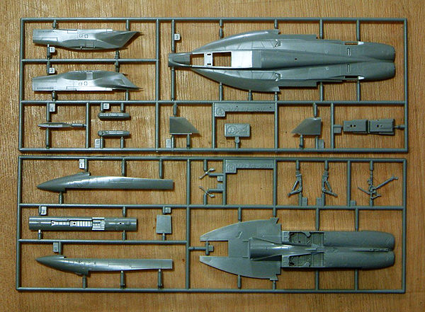Unassembled parts of a Hasegawa 1/72 F/A-18E kit. The frame surrounding the various parts is called the injection moulding "runner" or "sprue"