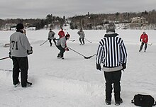 A game of pond hockey being played in Lac-Beauport, Quebec Pond hockey-LacBeauport2010-b.JPG