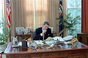 Reagan working on his first State of the Union Address in the Oval Office, 1982 President Ronald Reagan working on the State of the Union Address at his oval office desk.jpg