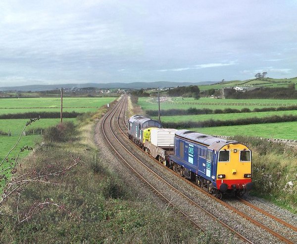 DRS Class 20 locomotive hauling a nuclear waste train, the original and continuing core service of the company