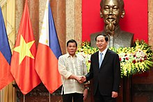 Duterte and Vietnamese President Tran Dai Quang in front of a statue of Ho Chi Minh in Hanoi, September 29, 2016 Rodrigo Duterte with Tran Dai Quang 092916.jpg