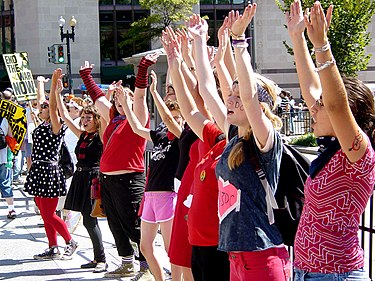 Radical cheerleaders perform a cheer in front of the White House S15 Radical Cheerleading 1.jpg