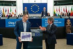 Олег Сенцов награжденный премией имени Сахарова в Европарламенте, 26 ноября 2019 года