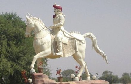 Statue of Sri Sawai Bhoj Bagaravat, one of the 24 Gurjar brothers collectively known as Bagaravats, at Dev Dham Jodhpuriya temple.